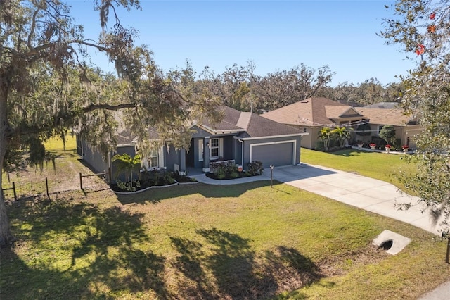 single story home with a garage and a front yard