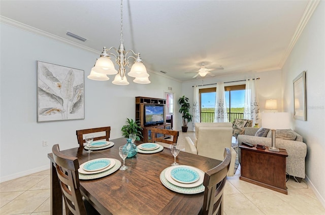 tiled dining area featuring ceiling fan with notable chandelier and crown molding