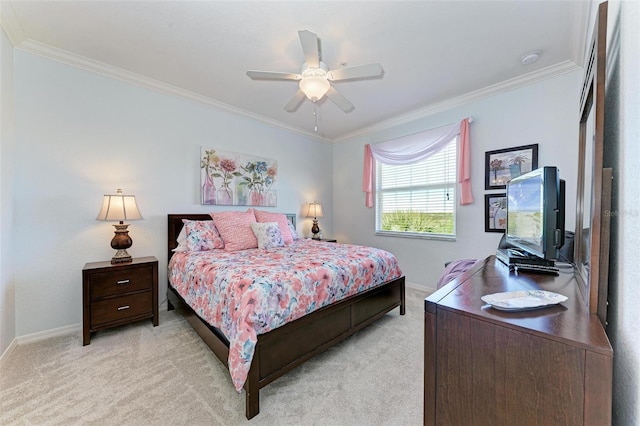 bedroom featuring ceiling fan, light colored carpet, and ornamental molding