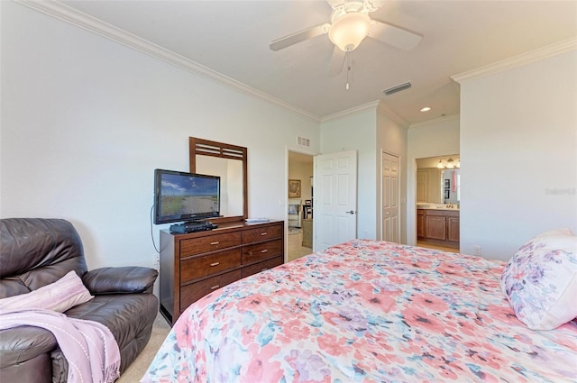 carpeted bedroom featuring connected bathroom, ceiling fan, and crown molding