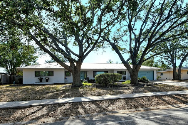 single story home with a garage