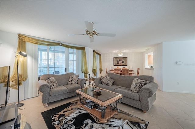 tiled living room with ceiling fan