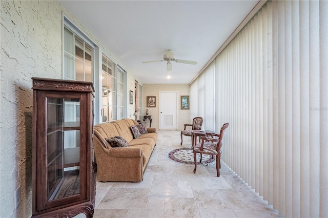 living room with ceiling fan