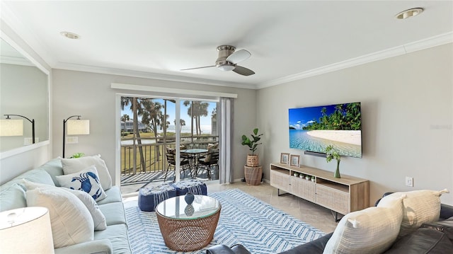 tiled living area featuring ceiling fan and ornamental molding