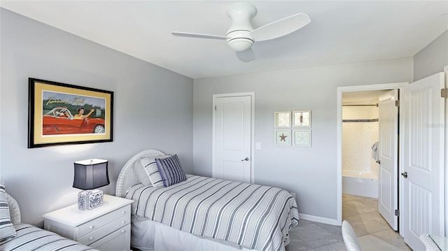 bedroom with ceiling fan, light tile patterned flooring, and baseboards