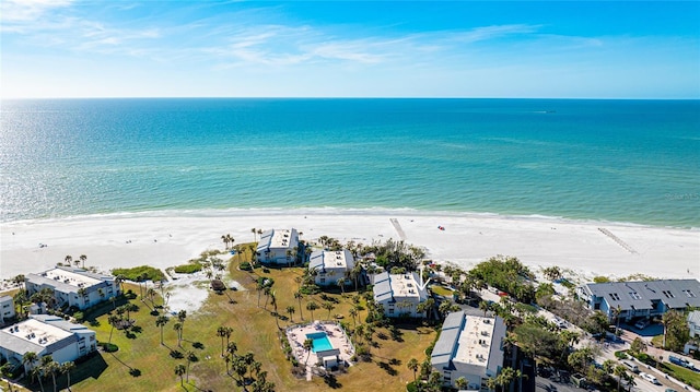 drone / aerial view with a view of the beach and a water view