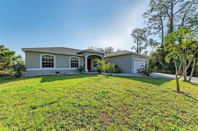 ranch-style house featuring a front lawn, an attached garage, and stucco siding