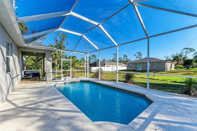 pool featuring a lanai and a patio