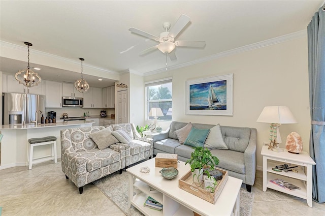 living room featuring ceiling fan with notable chandelier, light tile patterned floors, and crown molding