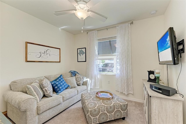 living room featuring ceiling fan and light carpet