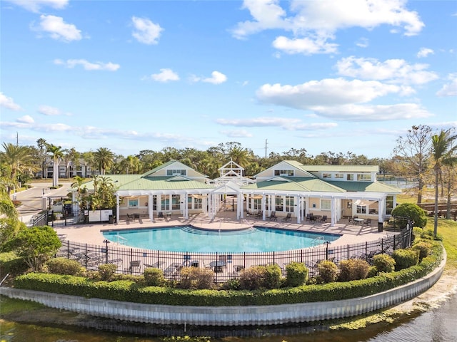 view of swimming pool with a patio area