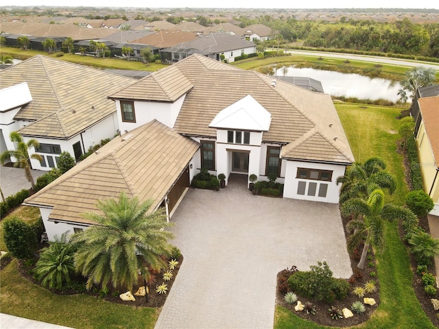 5305 Brookgrove Dr, Sarasota, FL 34238 - drone / aerial view with a water view
