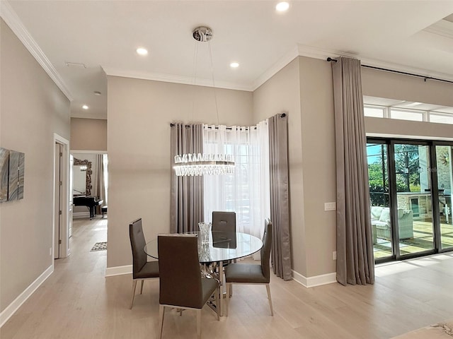 5305 Brookgrove Dr, Sarasota, FL 34238 - dining room with recessed lighting, baseboards, crown molding, and light wood-style floors