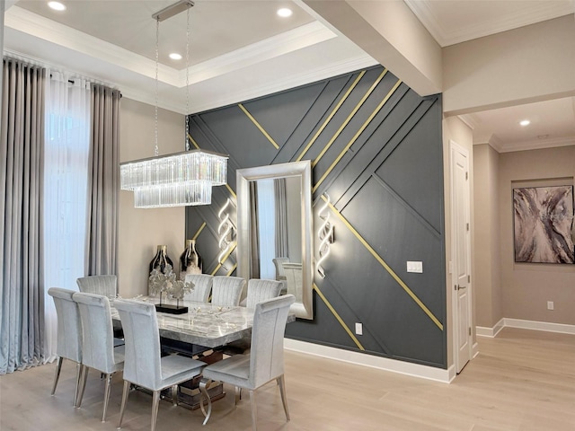 5305 Brookgrove Dr, Sarasota, FL 34238 - dining area featuring light wood finished floors, recessed lighting, crown molding, and baseboards