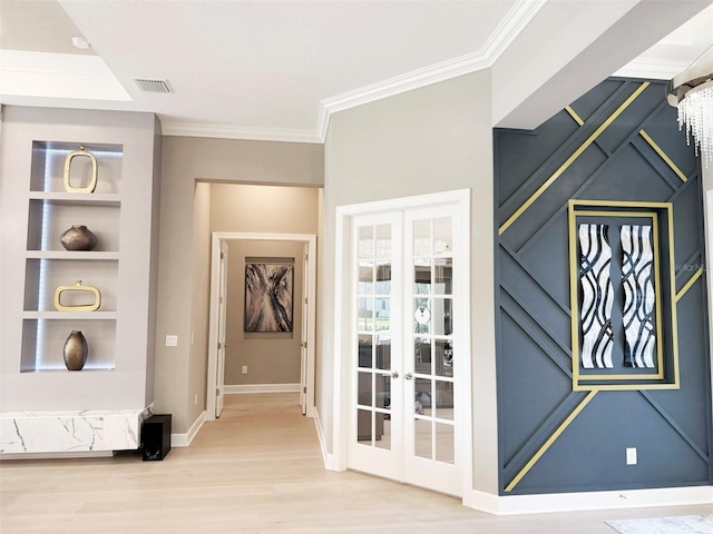 5305 Brookgrove Dr, Sarasota, FL 34238 - hallway featuring built in features, wood finished floors, visible vents, baseboards, and crown molding