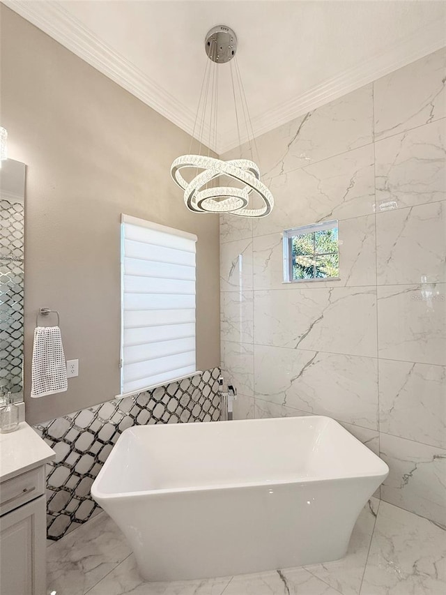 5305 Brookgrove Dr, Sarasota, FL 34238 - full bathroom with a soaking tub, marble finish floor, ornamental molding, and vanity