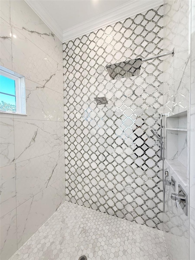 5305 Brookgrove Dr, Sarasota, FL 34238 - bathroom featuring a tile shower and ornamental molding