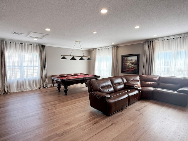 5305 Brookgrove Dr, Sarasota, FL 34238 - rec room with visible vents, light wood finished floors, pool table, a textured ceiling, and crown molding