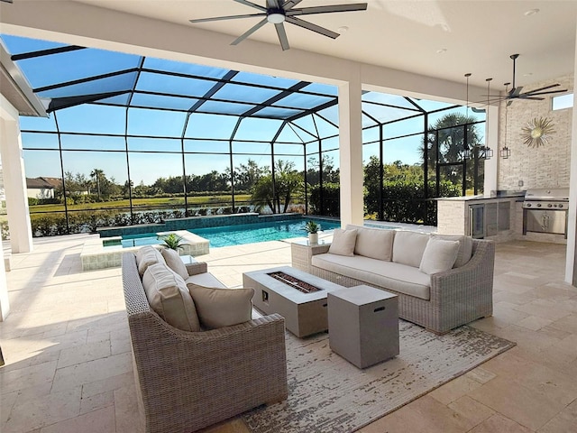5305 Brookgrove Dr, Sarasota, FL 34238 - outdoor pool with a lanai, an outdoor living space with a fire pit, exterior kitchen, and a patio