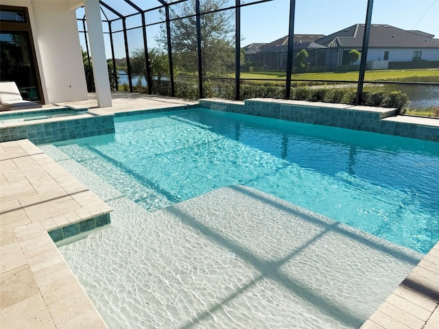 5305 Brookgrove Dr, Sarasota, FL 34238 - outdoor pool featuring a lanai, a patio area, an in ground hot tub, and a residential view