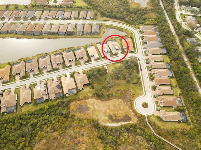 5305 Brookgrove Dr, Sarasota, FL 34238 - bird's eye view with a residential view and a water view