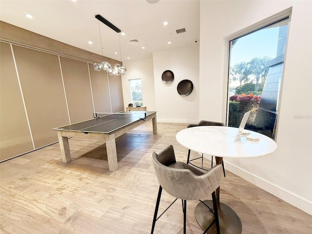 5305 Brookgrove Dr, Sarasota, FL 34238 - rec room featuring light wood-style flooring, recessed lighting, baseboards, and visible vents