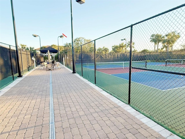 5305 Brookgrove Dr, Sarasota, FL 34238 - view of tennis court with fence