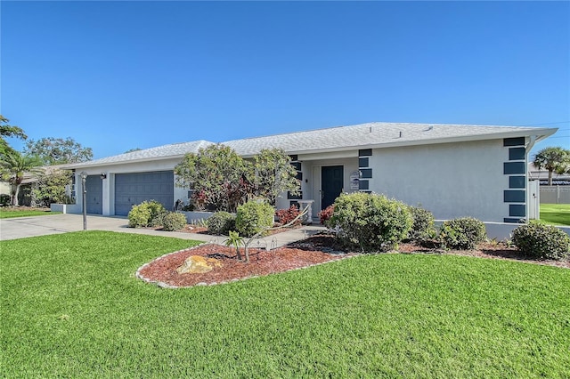 ranch-style house with a front yard and a garage