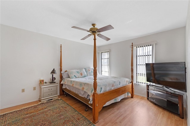 bedroom featuring ceiling fan and light hardwood / wood-style flooring