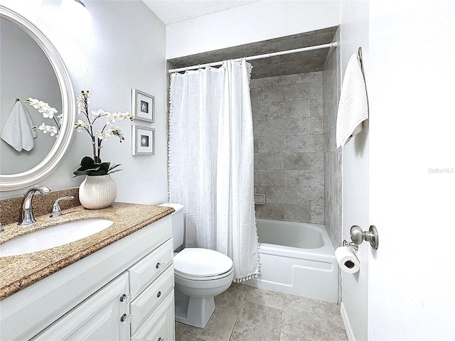 full bathroom featuring shower / bath combo, vanity, and toilet