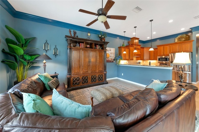 living room featuring ceiling fan and ornamental molding