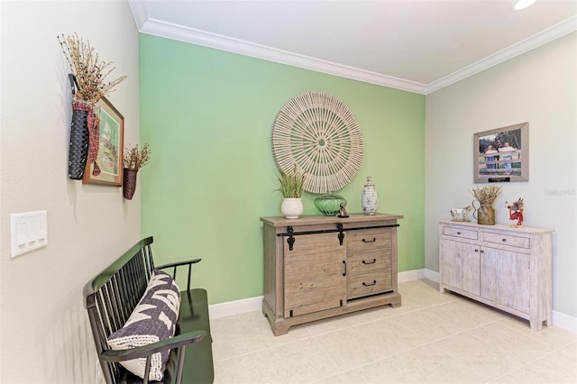 sitting room featuring light tile patterned floors and crown molding