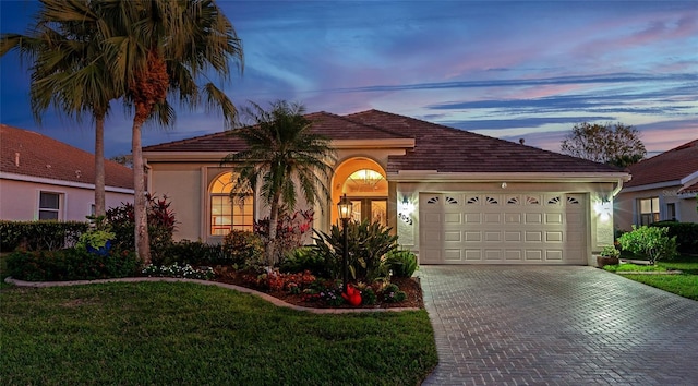 view of front of home with a yard