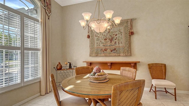 dining space with an inviting chandelier and light tile patterned flooring