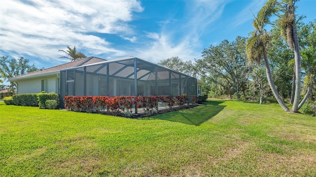 view of yard featuring glass enclosure