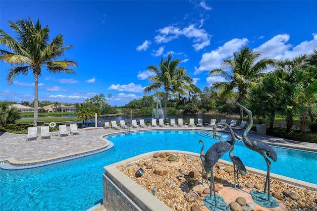 view of swimming pool with a patio area