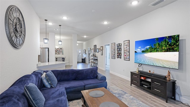 living room featuring light hardwood / wood-style flooring