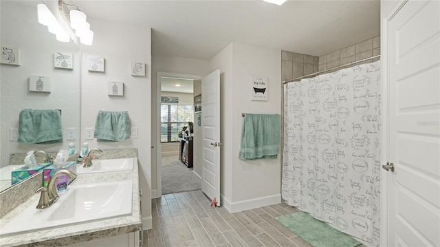 bathroom with vanity and a shower with shower curtain