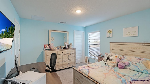 bedroom with a textured ceiling