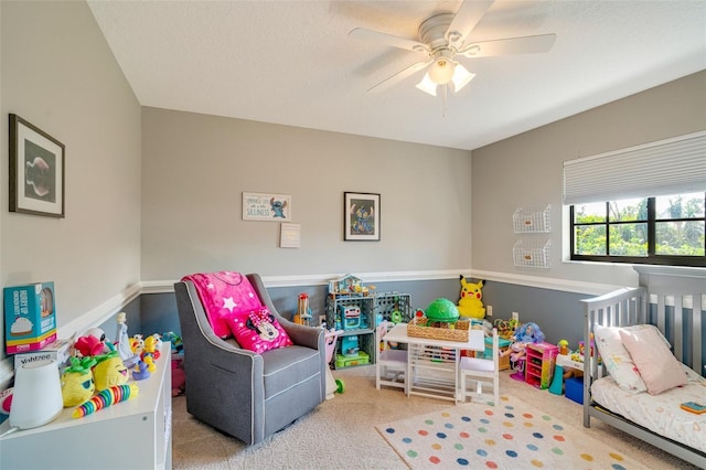 carpeted bedroom featuring ceiling fan