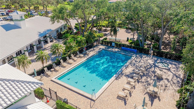 view of swimming pool featuring a patio area