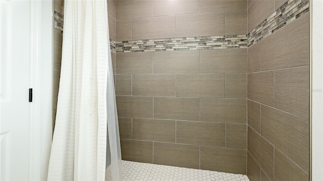 bathroom featuring a shower with curtain