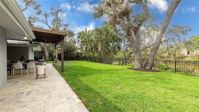 view of yard with outdoor lounge area, a water view, a ceiling fan, a fenced backyard, and a patio
