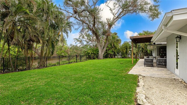 view of yard featuring a fenced backyard and a patio area