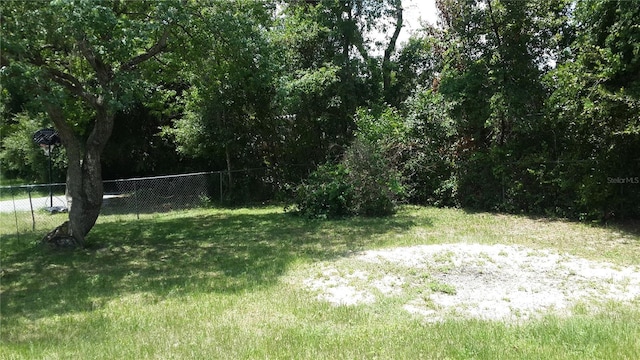 view of yard with fence