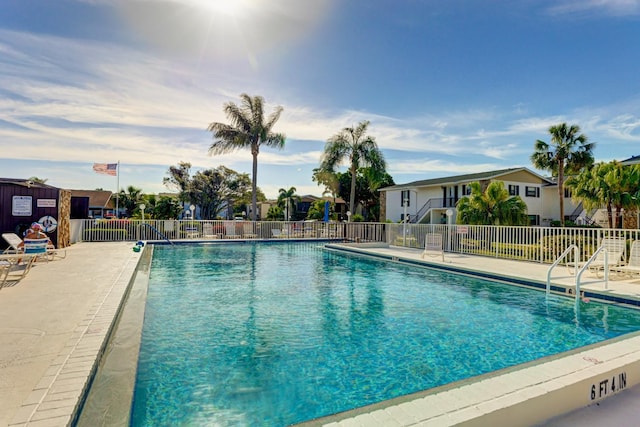 view of swimming pool with a patio area