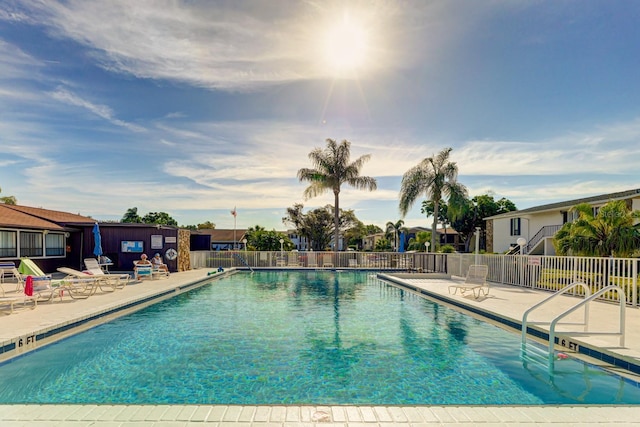 view of swimming pool with a patio area