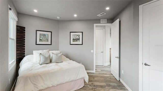 bedroom featuring light wood-type flooring