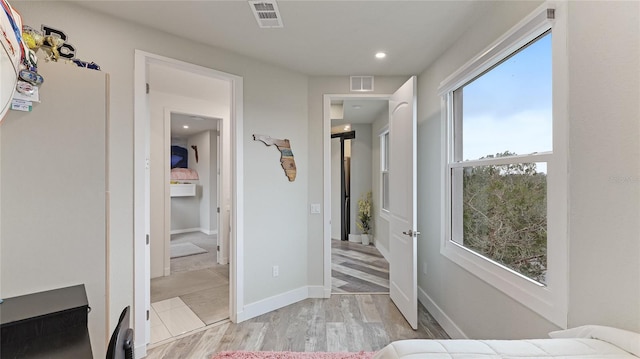 bedroom with light hardwood / wood-style flooring