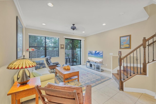 tiled living room featuring ceiling fan and ornamental molding